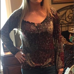 Dressy three quarter length top.